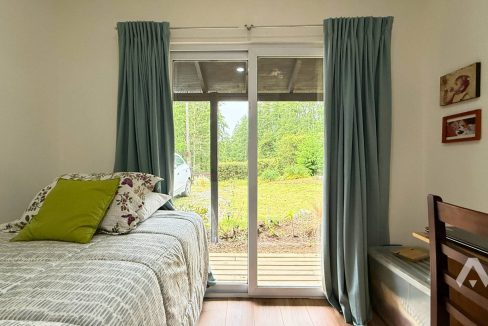 Parcela con dos casas y piscina en Pucón 12