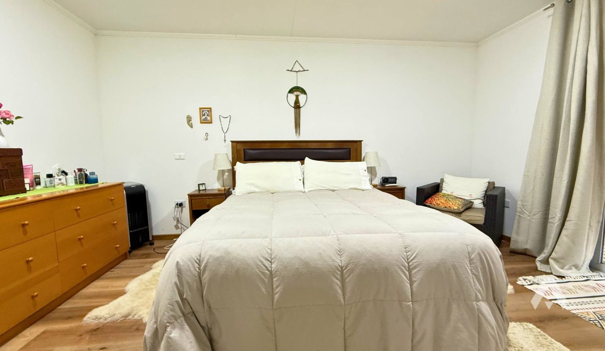 Parcela con dos casas y piscina en Pucón 17